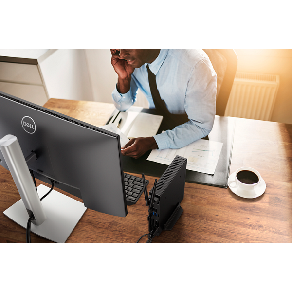 Young Businessman Talking on the Phone Using a Dell P2422HE