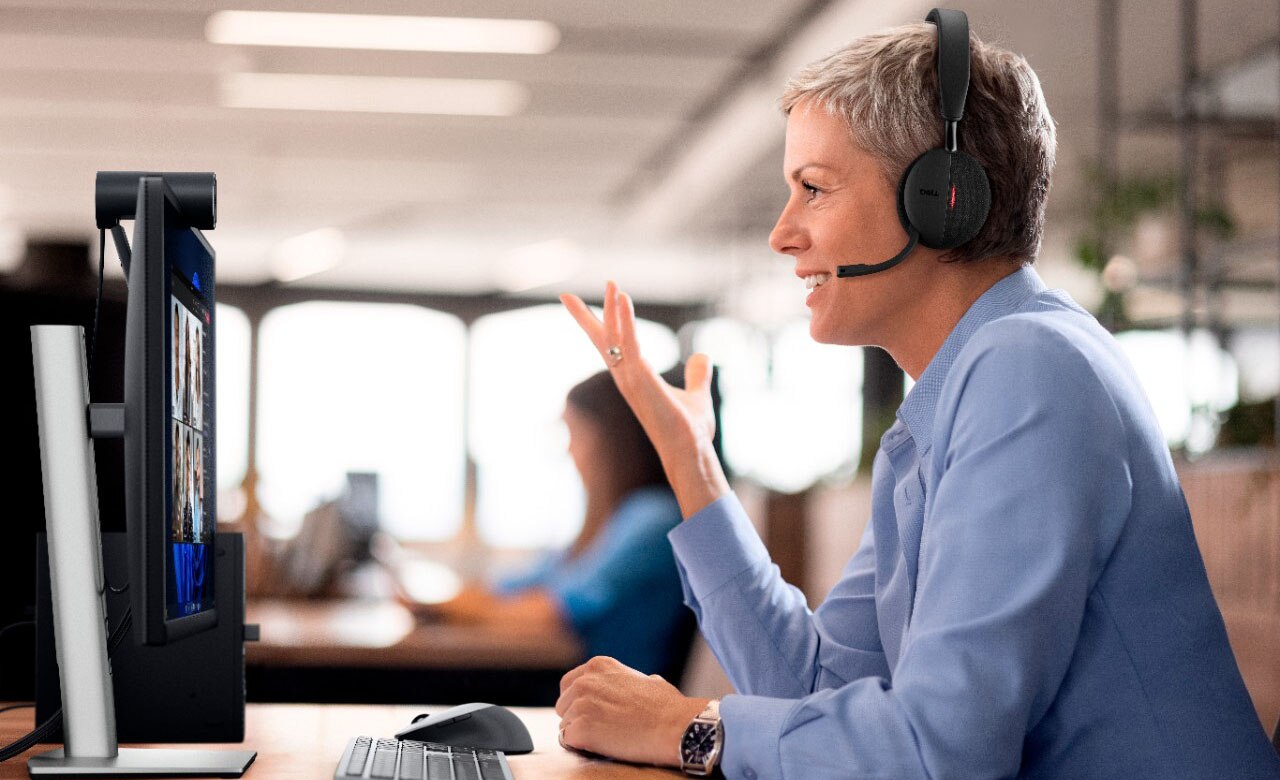 Woman Using a Headset in a Call Center