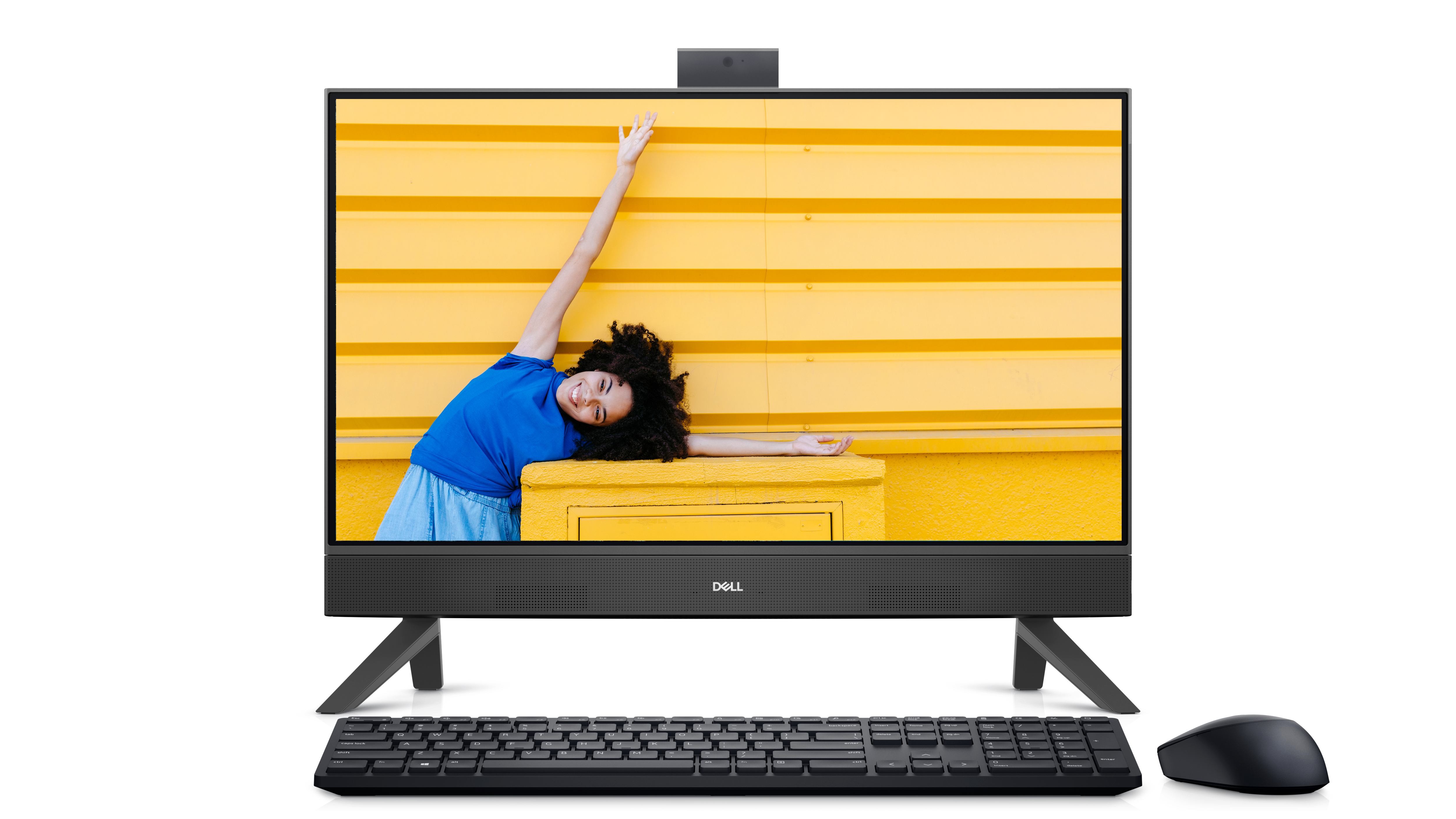 Picture of a black Dell Inspiron 24 5415 All-in-One with a smiley girl in front of a yellow wall on the monitor screen.