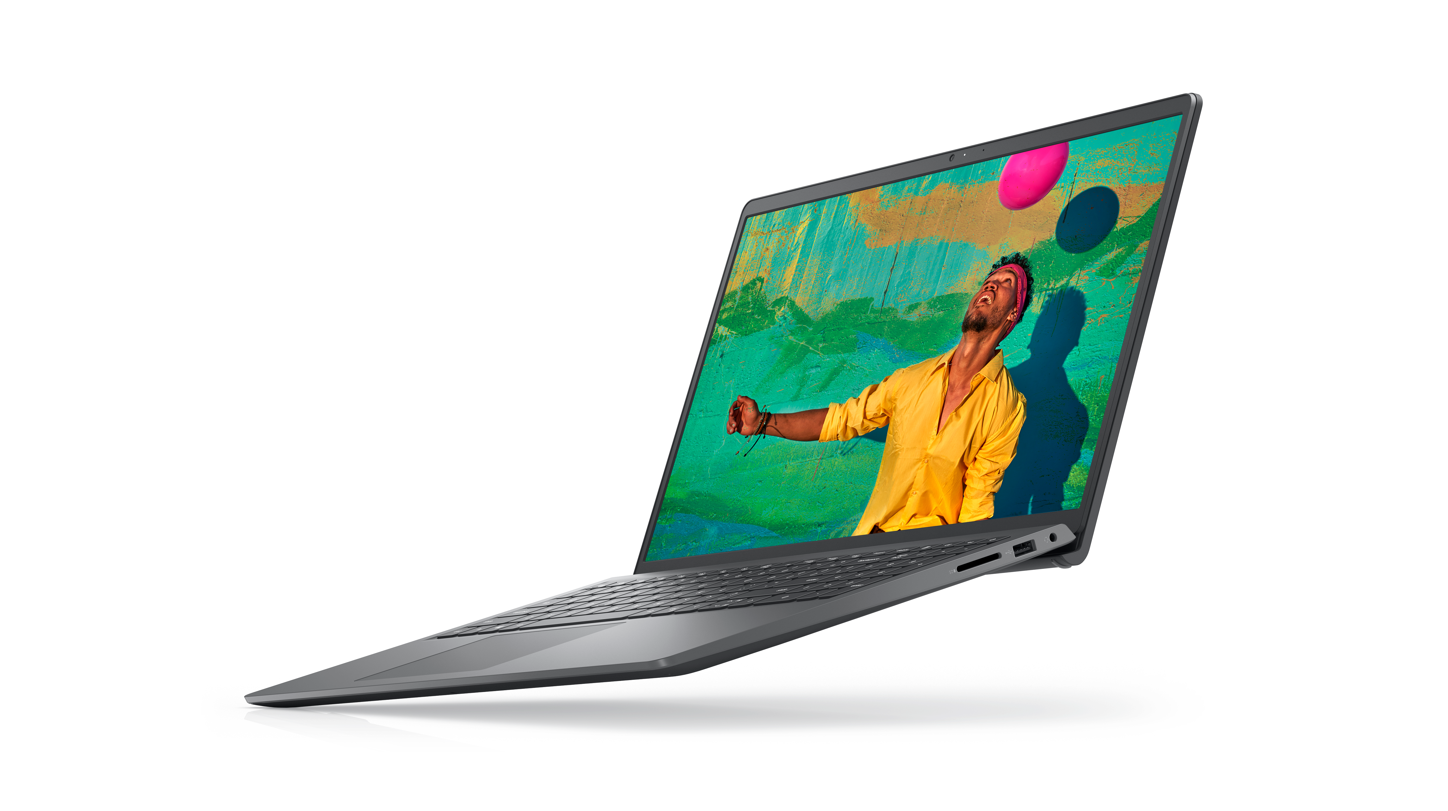 Picture of a Dell Inspiron 15 3520 Laptop with a smiley man wearing a yellow shirt staring a pink ball above his head.