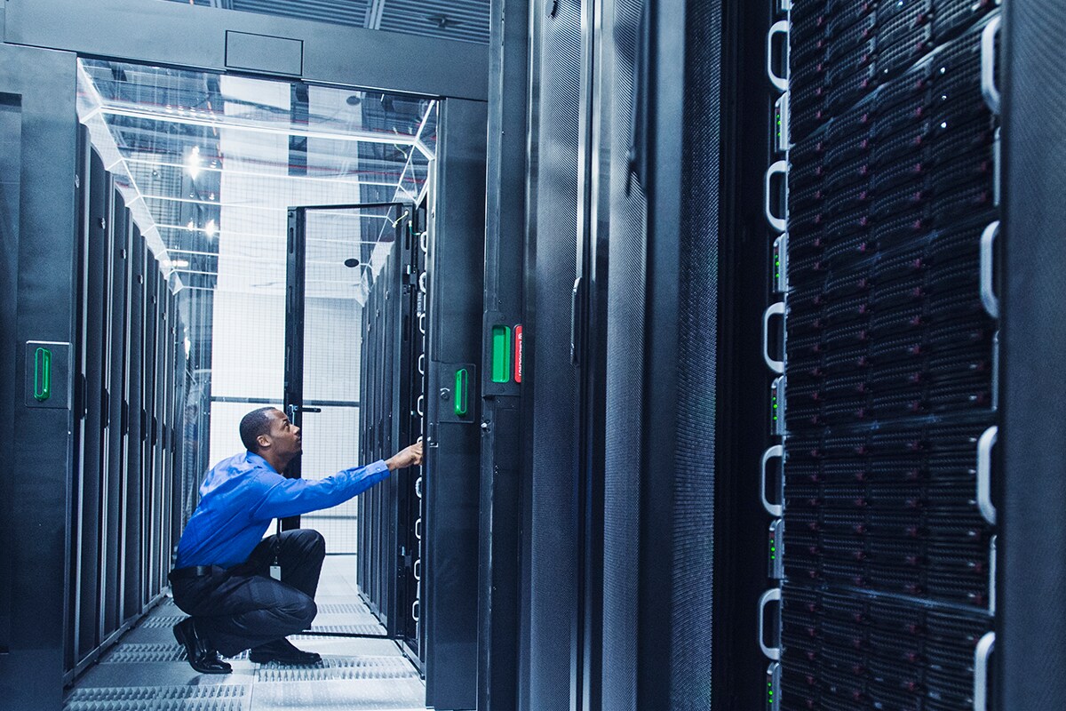 Technician Working in Server Room