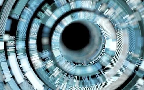 Digitally rendered image, close up of futuristic interface, with blue, white, silver, and gray colors around a black circular center.