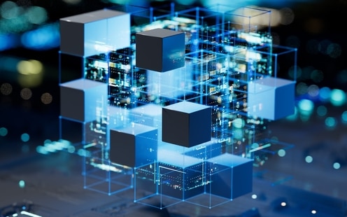 Digitally generated image of 3d cubes connected, hovering above a computer or server motherboard.
