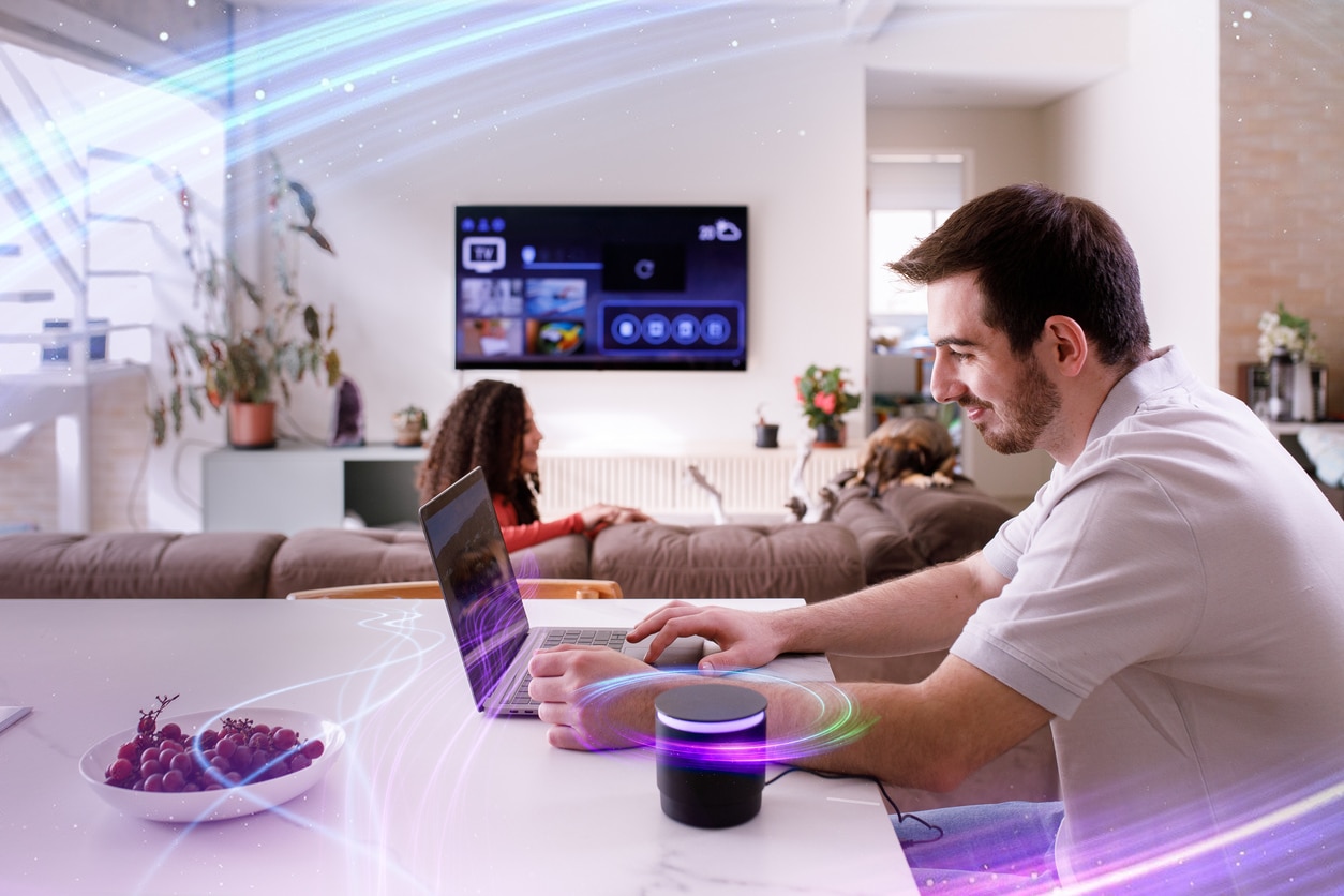 Couple using technologies of smart home on daily tasks