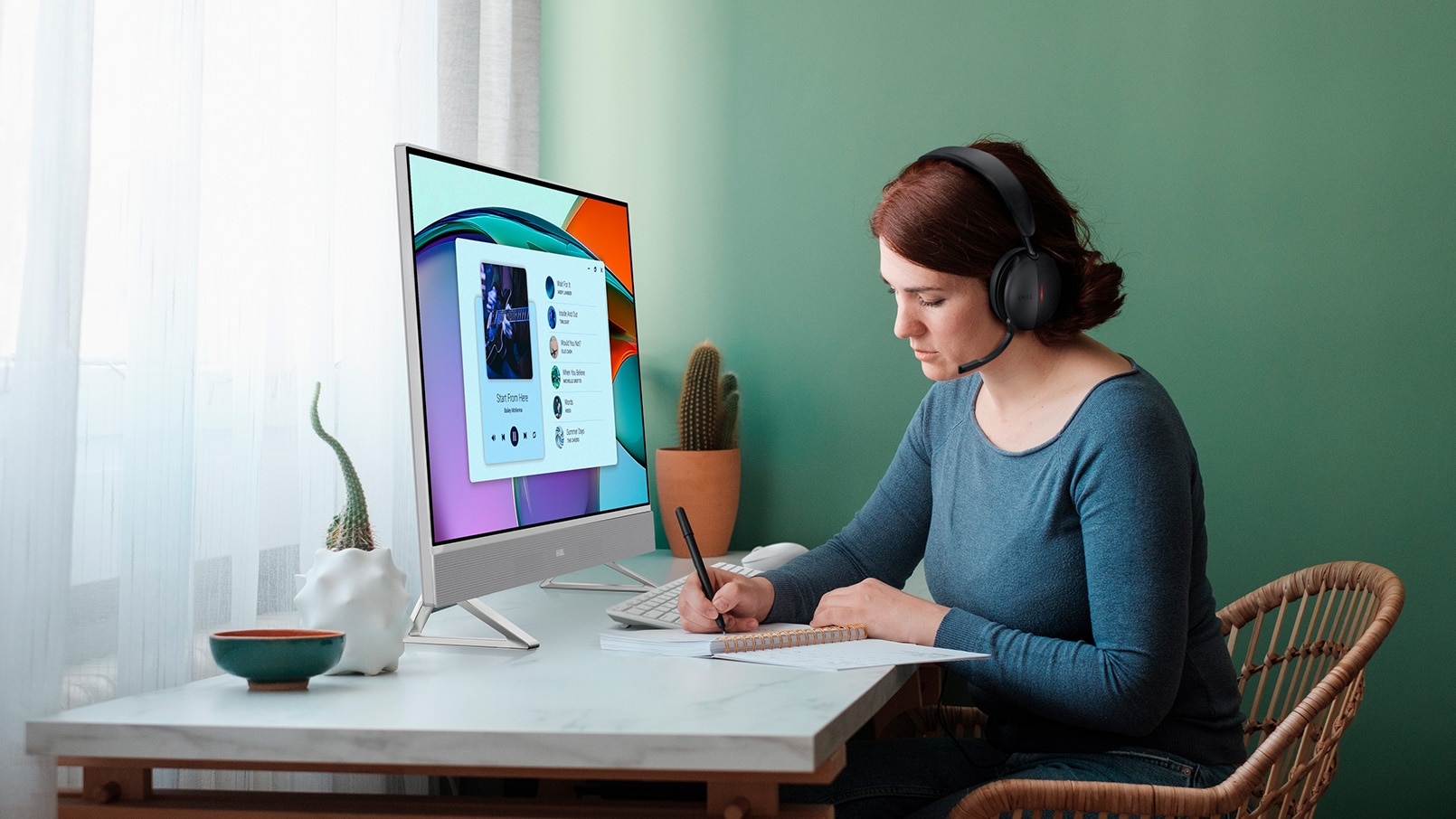 Young Woman Sitting at Desk with Headset
