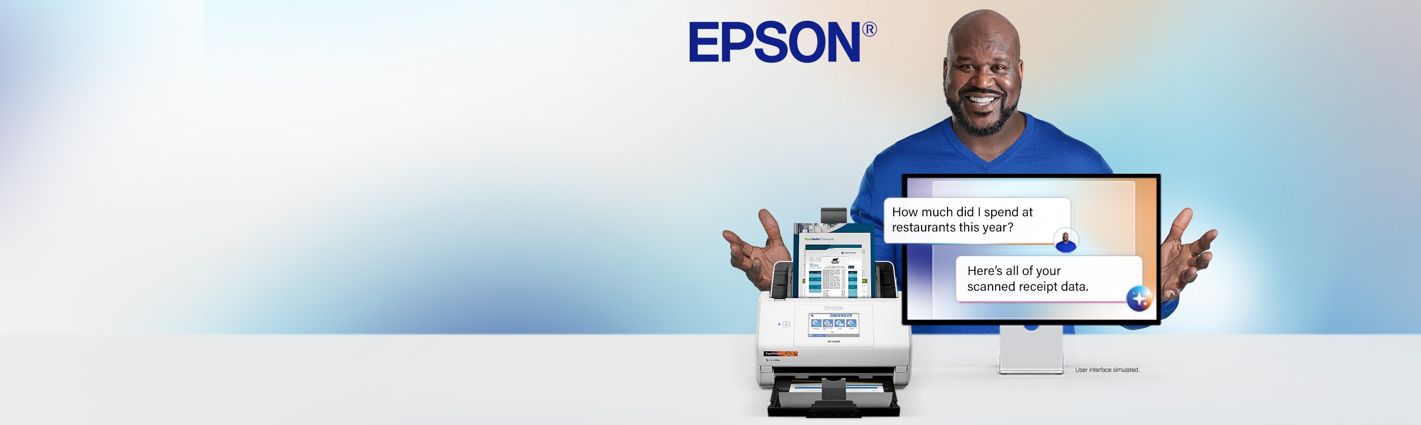 image of Epson RR-620W next to monitor and Shaq standing behind both.