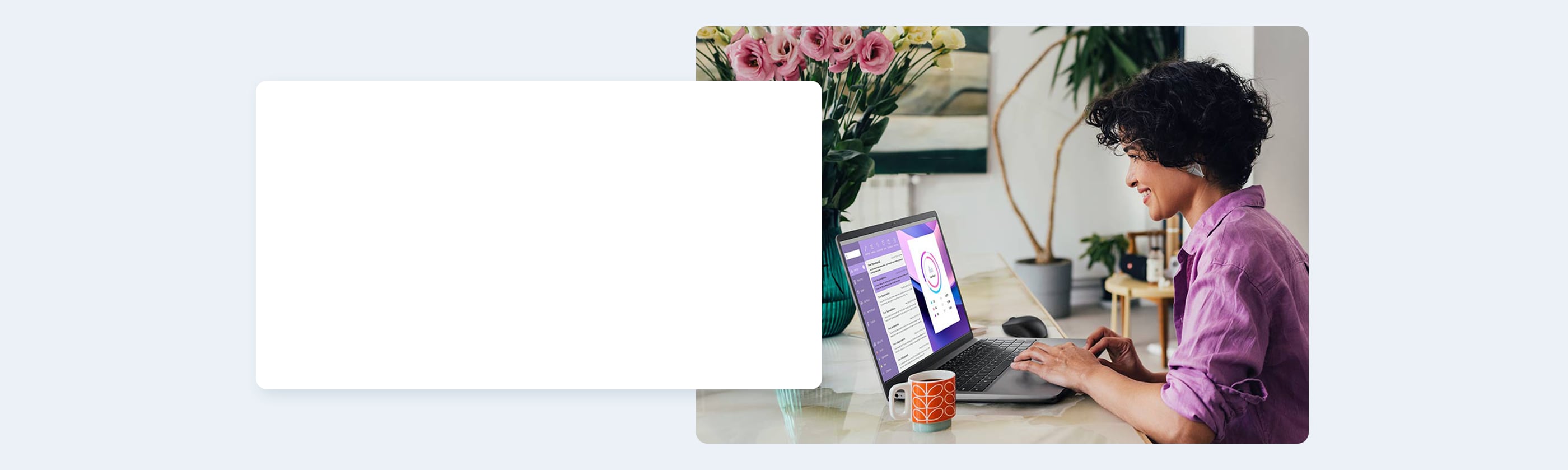 A side view of a beautiful Latin American entrepreneur smiling while watching something on her laptop, floral arrangement on desk with the screen show