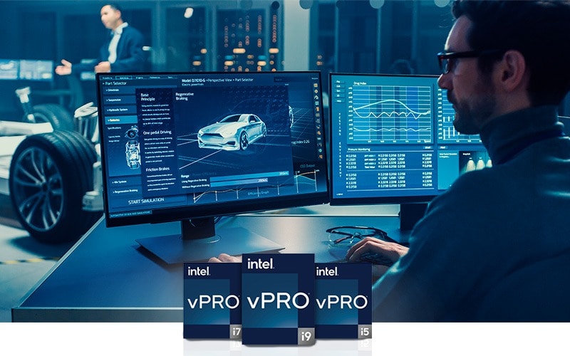 Man working on dual monitors displaying automotive designs in a high-tech lab with Intel vPro processor badges.