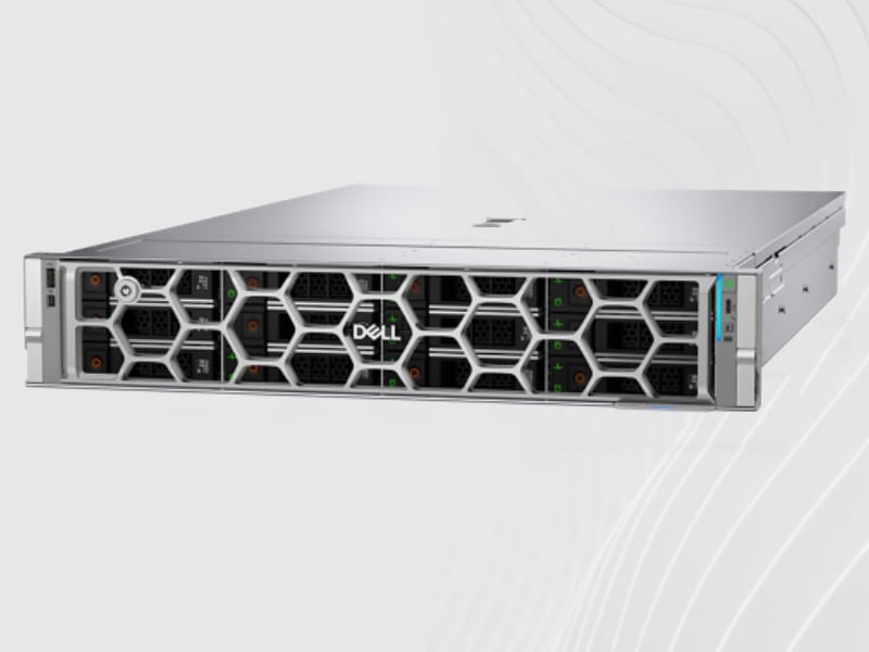 Silver Dell PowerEdge R570 rack server with a honeycomb bezel and drive bays against a wavy light gray background.