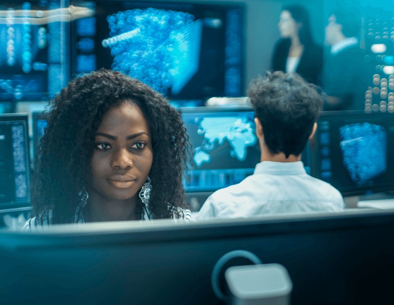 Female Computer Engineer Works on a Neural Network