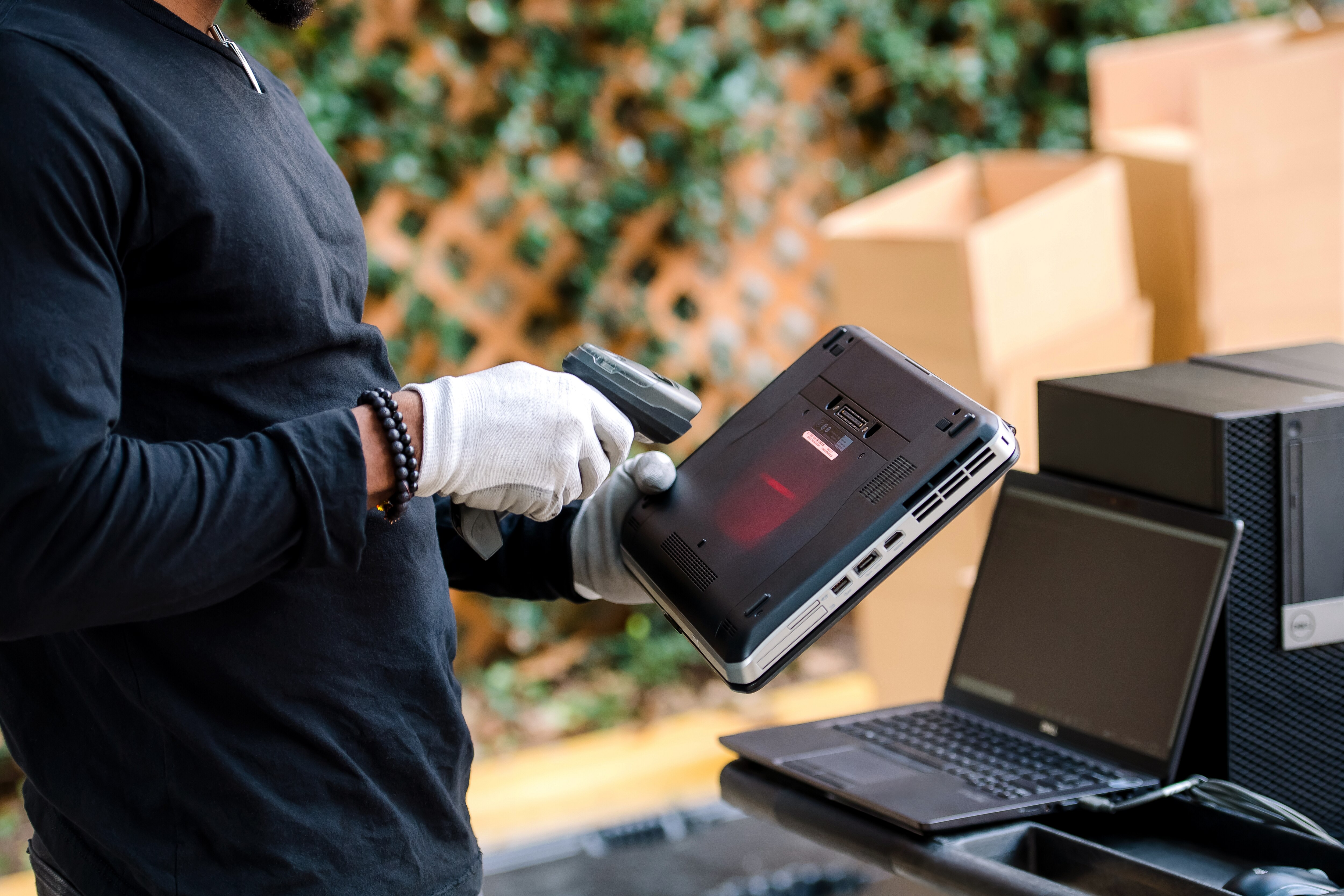 Man Checking Computer Equipment