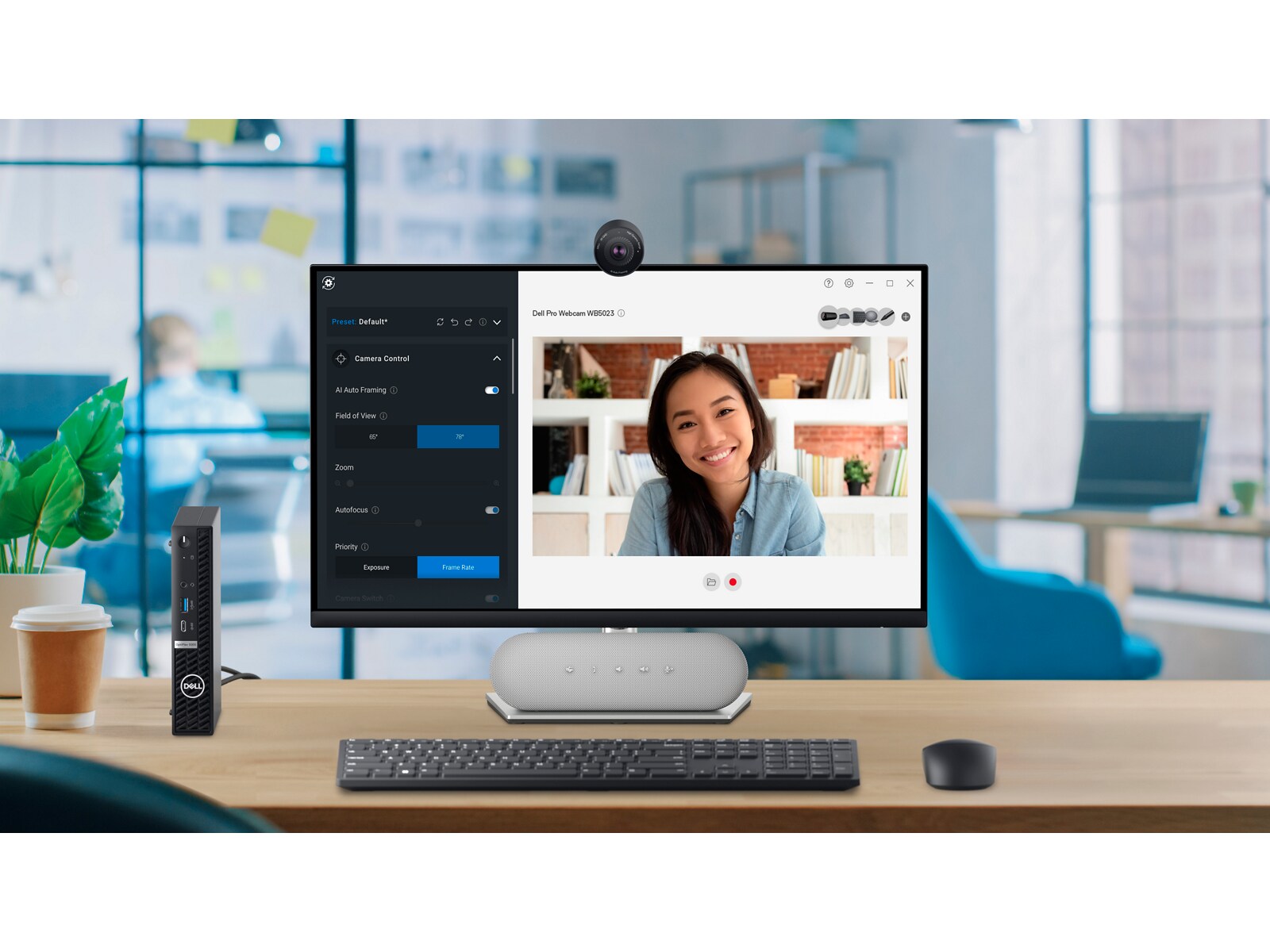 Monitor and Work Desk Setup with a Woman on a Video Call