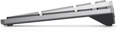 Bild einer Dell Mehrgeräte-Wireless-Tastatur KB700 mit der Höhenanpassung des Produkts auf der linken Seite.