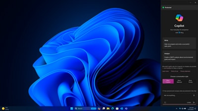 Laptop homepage with Microsoft Windows 11 blue logo as background and Copilot opened.