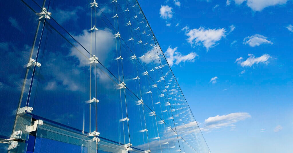 Clouds Reflected on Office Building
