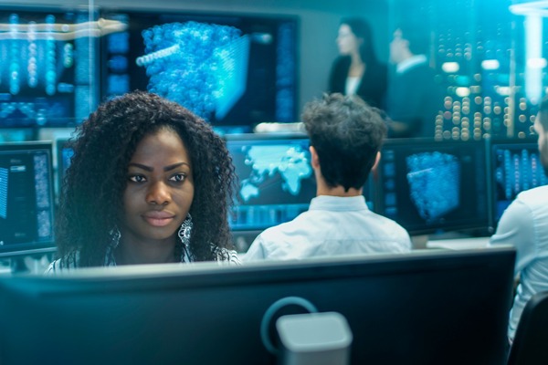 Female Computer Engineer Works on a Neural Network