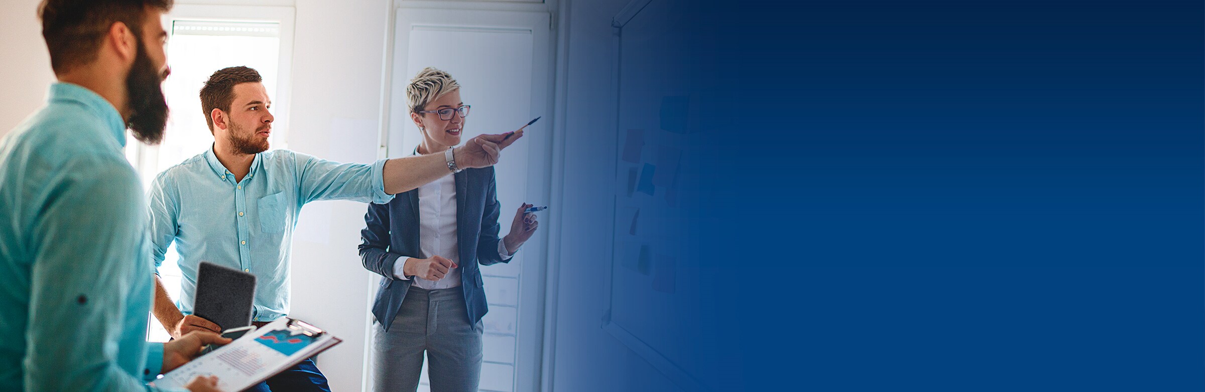 Dell Financial Services Banner - Man in a Data Center on Laptop - Desktop