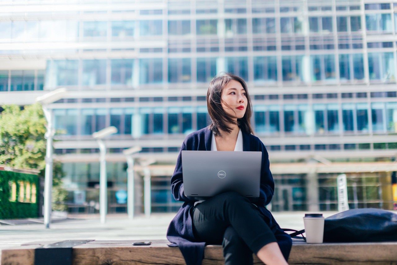 Asian Businesswoman Working with Laptop