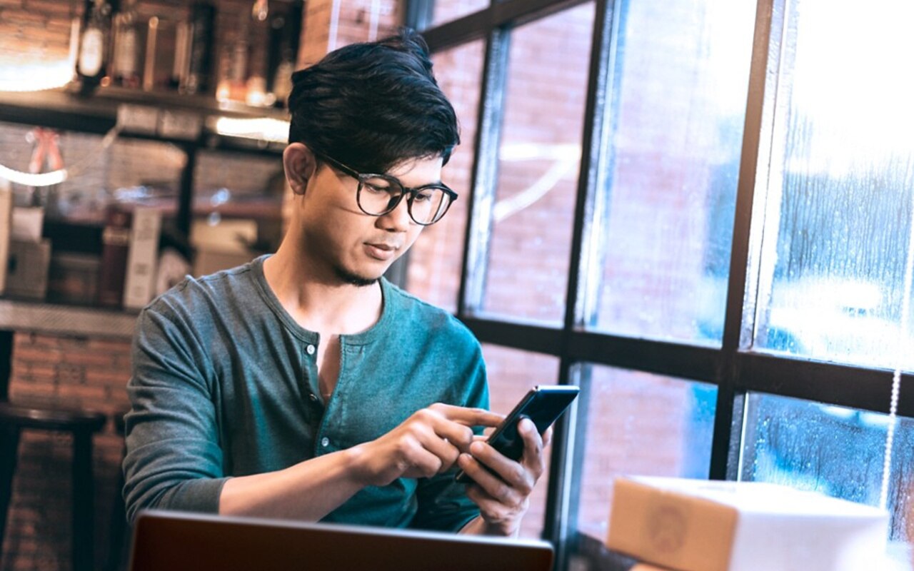 Young Man Working at Business 