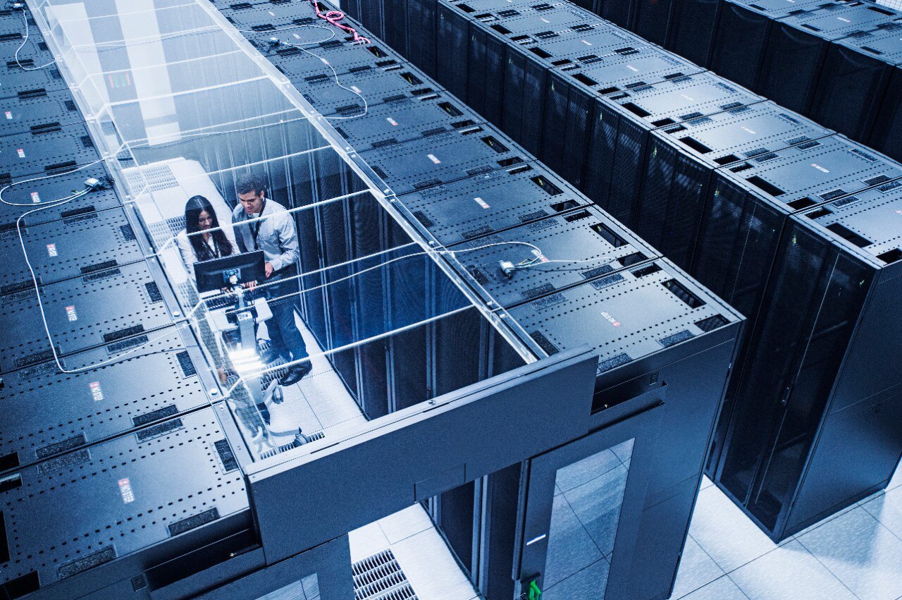 High Angle View of Technicians Working in a Server Room