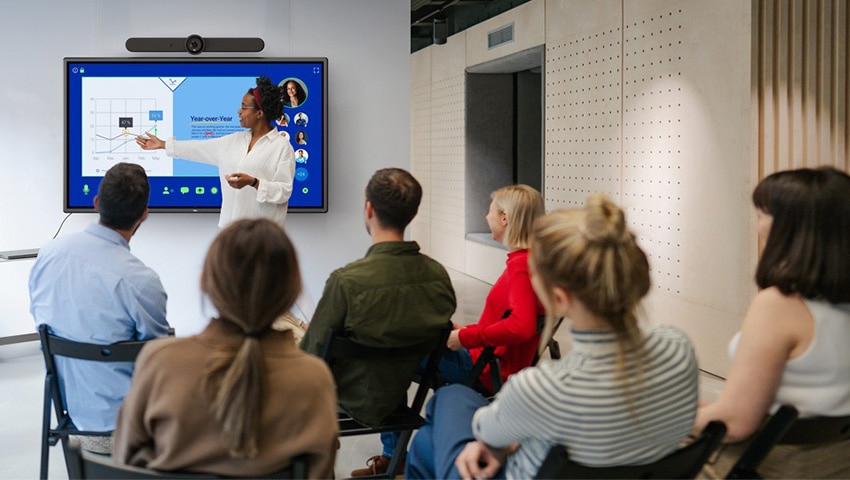 Colleague Presenting on a Dell P7525QT Monitor