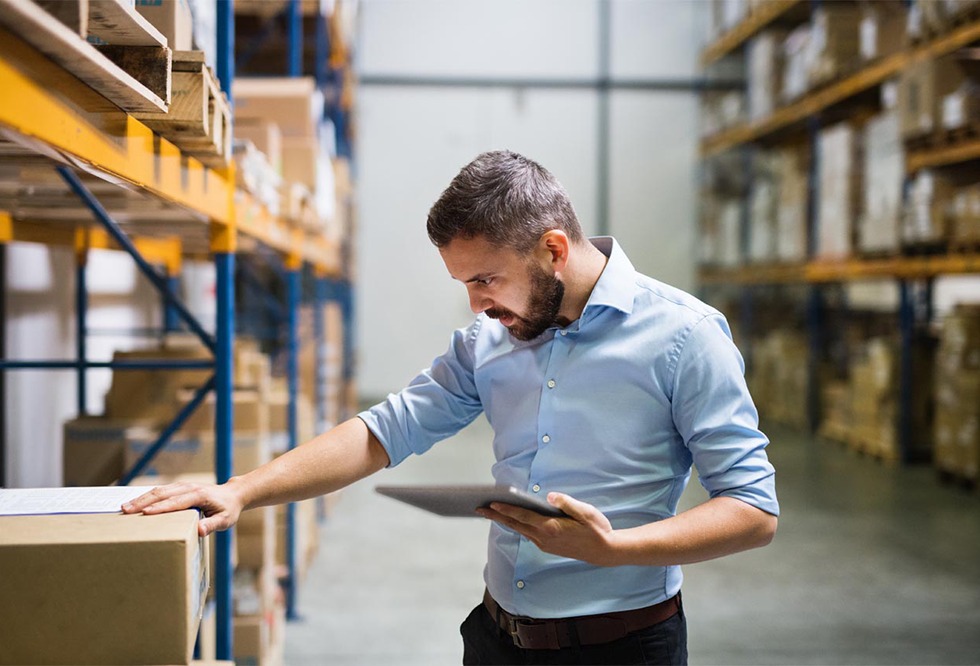 Warehouse Worker with a Tablet