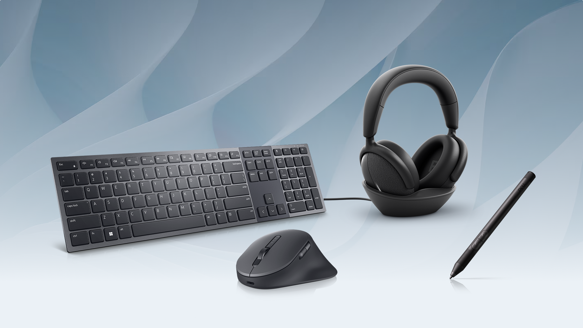 Image of PC accessories that include headphones, pen, keyboard and mouse