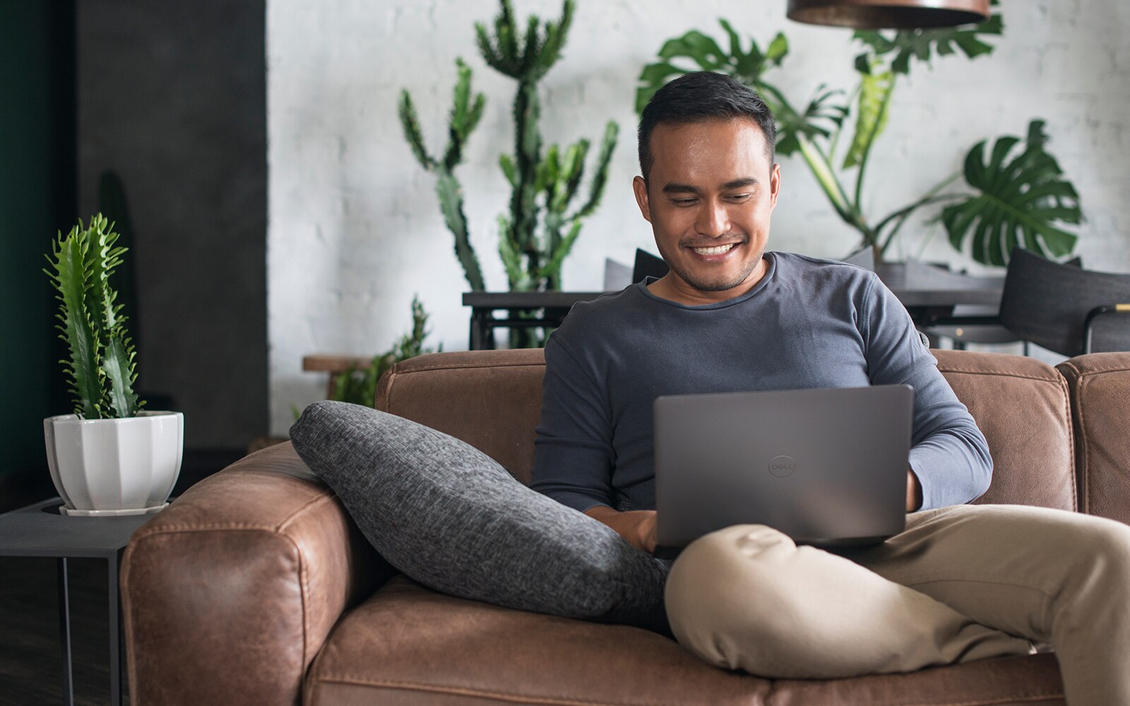 Young Asian man working at home