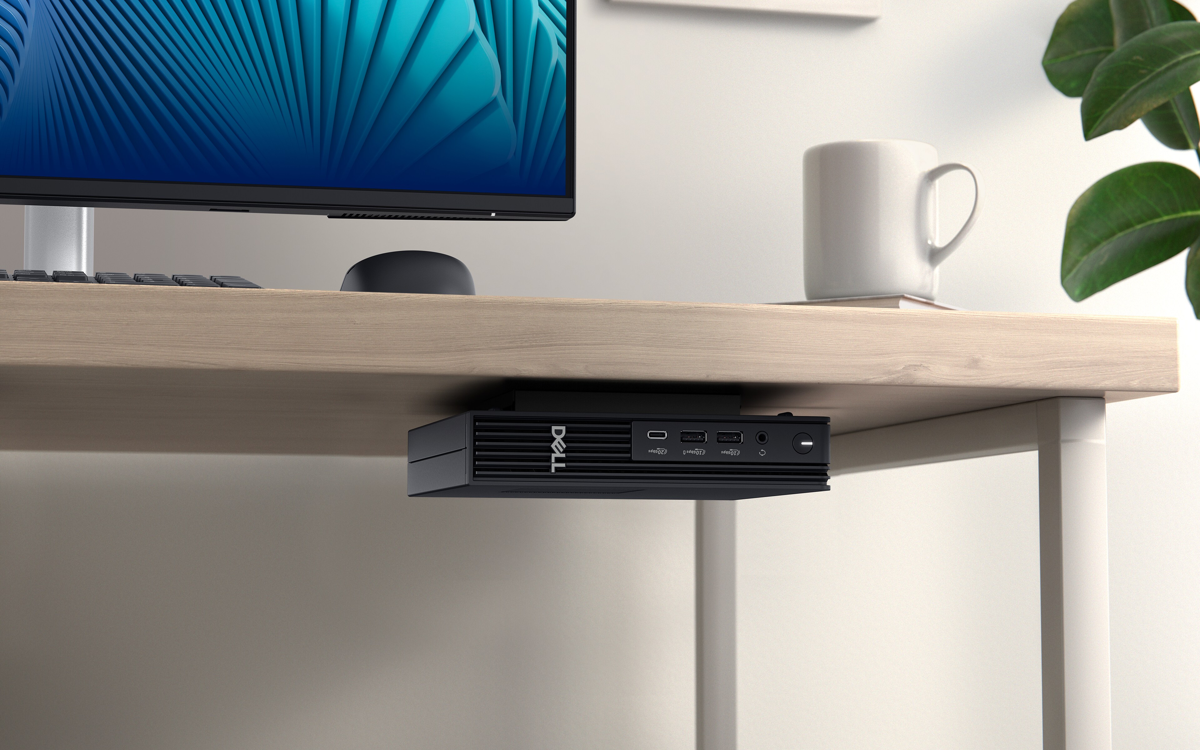 Dell Pro Micro Plus mounted under home office desk.