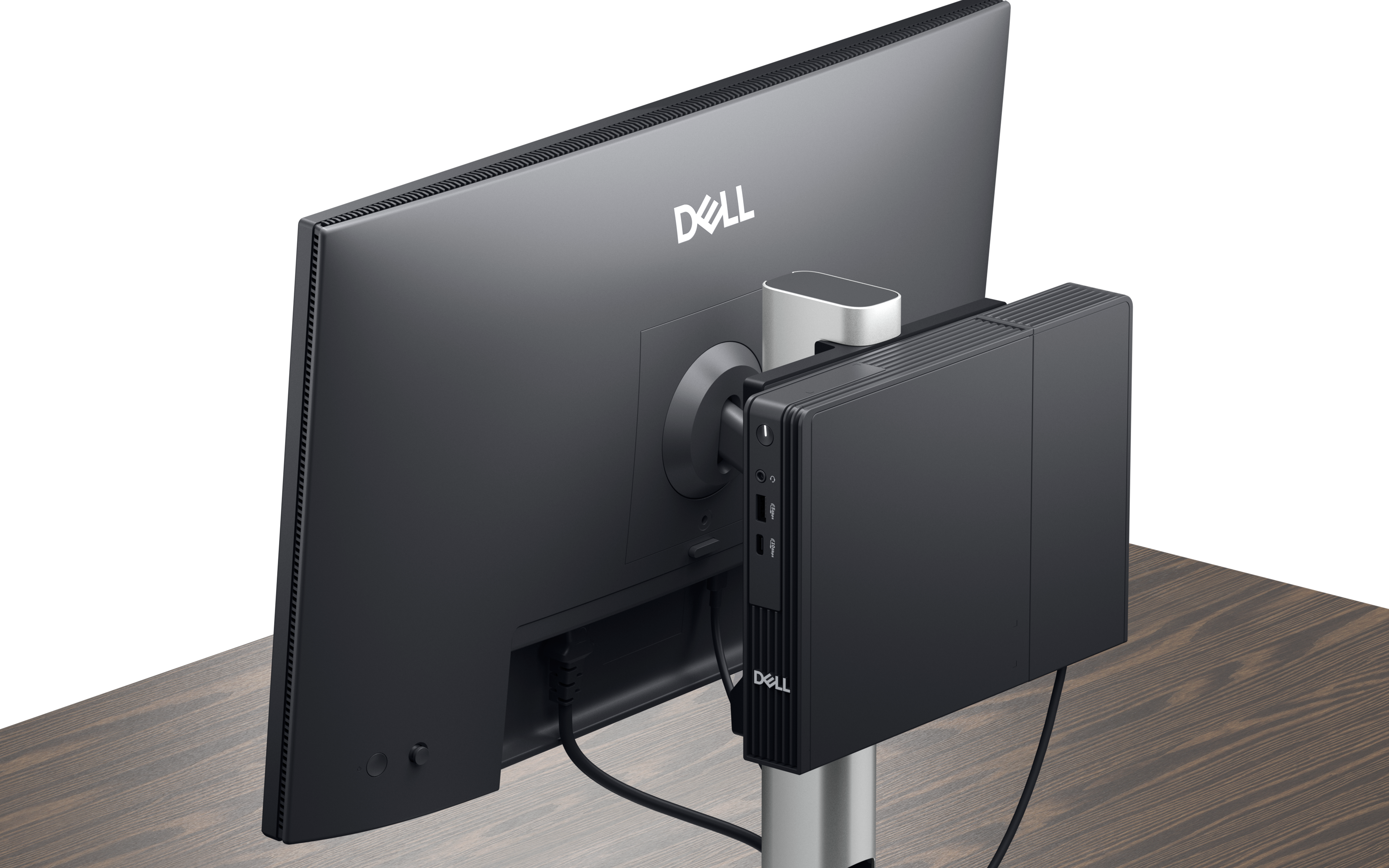 Dell Pro Micro image of Micro mounted on the back of monitor stand.