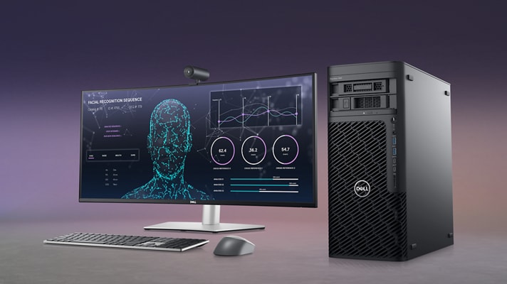 صورة لمحطة العمل البرجية طراز Precision 7865 من Dell بجوار الشاشة، ولوحة المفاتيح، والماوس، وكاميرا الويب من Dell.