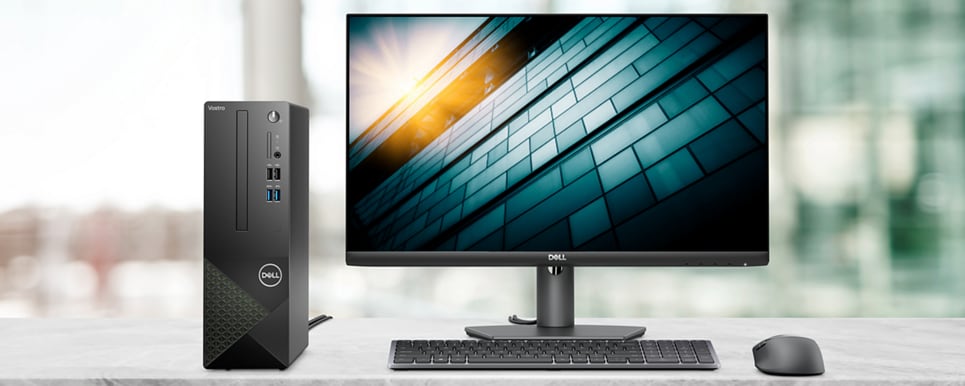 Imagem de um Dell Vostro 3710 de Fator de Forma Reduzido ligado a um Monitor, um teclado e rato Dell.