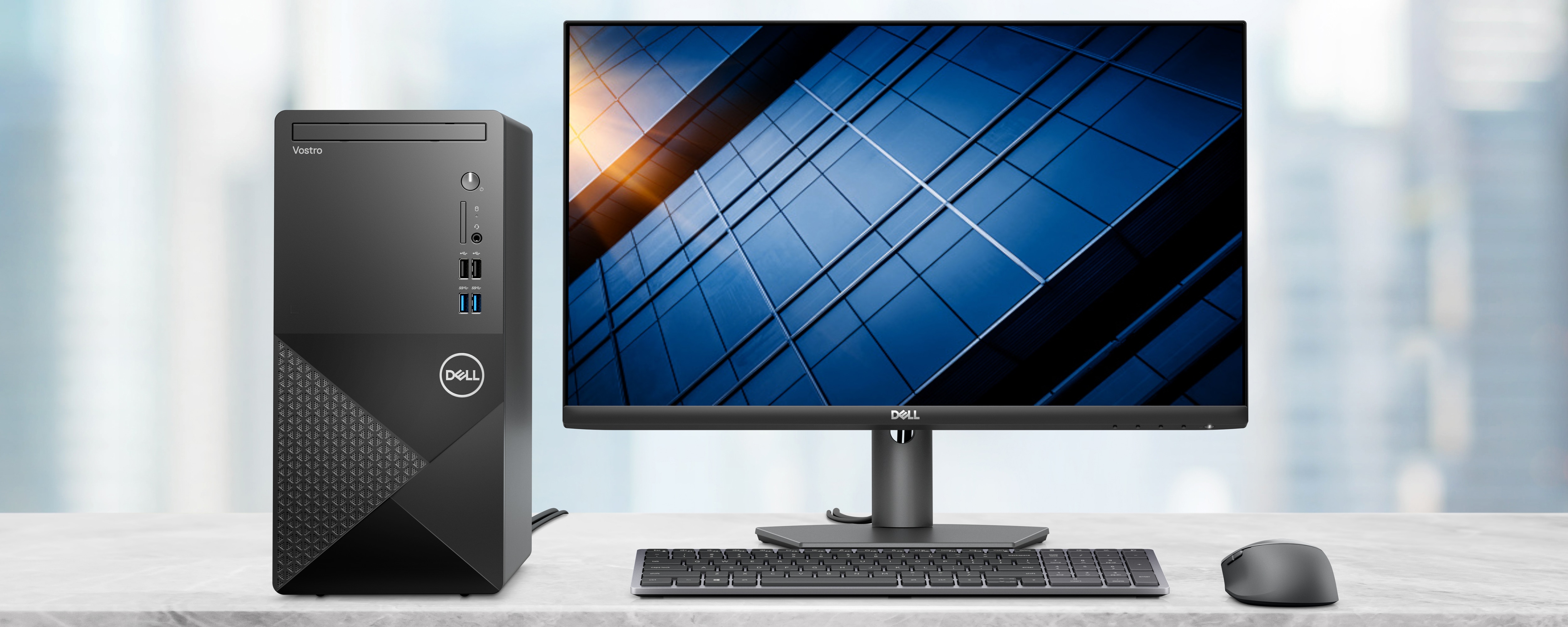 Bild eines Dell Vostro Tower 3910 Desktop-PCs, der mit einem Dell Monitor, einer Tastatur und einer Maus verbunden ist.