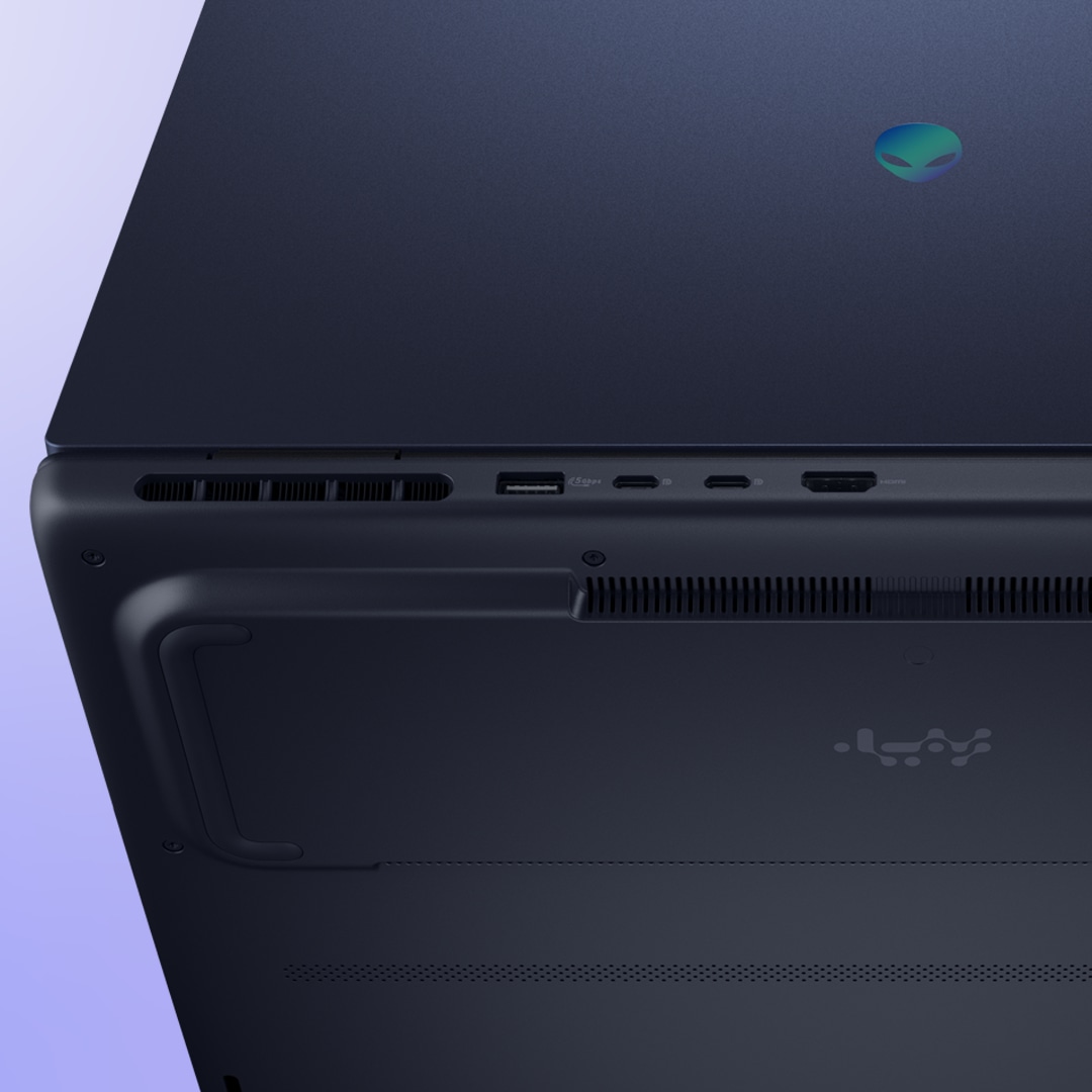 A close-up image of an Alienware Aurora 16 gaming laptop, highlighting the fluid contours of laptop’s design-focused chassis.