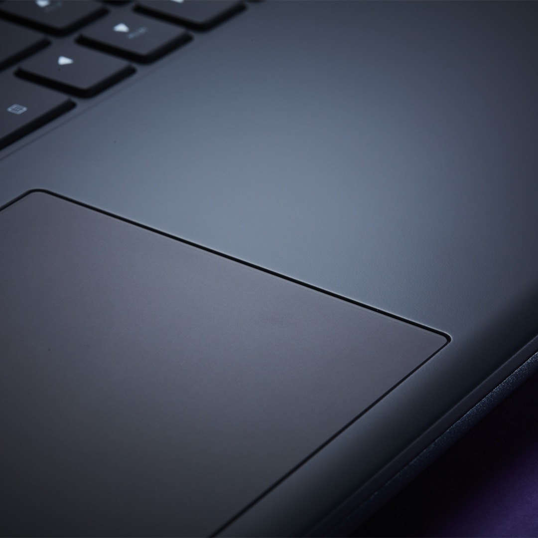 A close-up image of an Alienware 16X Aurora gaming laptop with an ergonomic palmrest.
