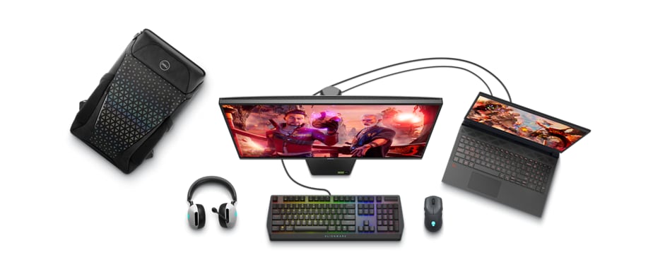 Picture of a Dell 5525 Gaming Laptop connected to a monitor, a keyboard and mouse with a backpack and a headset next to it.