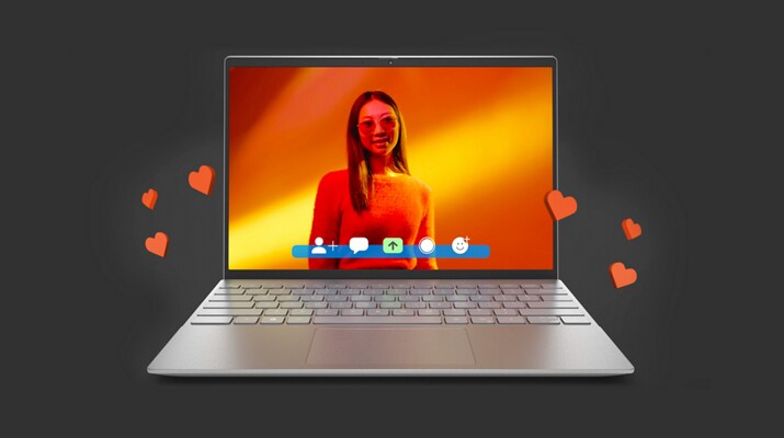 Imagem de um notebook Dell Inspiron 13 5320 com uma mulher sorridente e corações vermelhos flutuando para fora da tela.