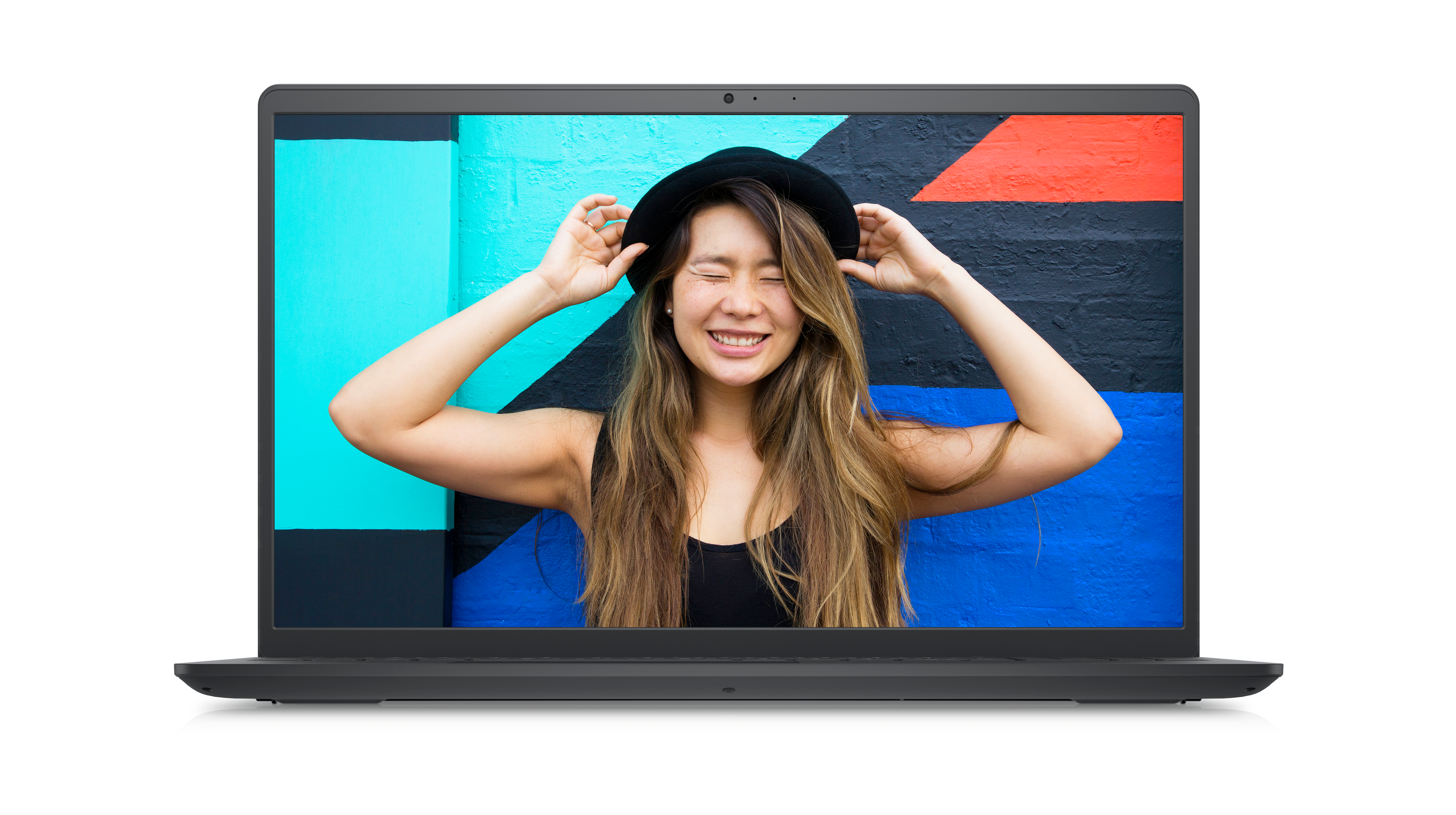 Picture of a Dell Inspiron 15 3520 Laptop with a smiley girl wearing a black hat and t-shirt on the screen.