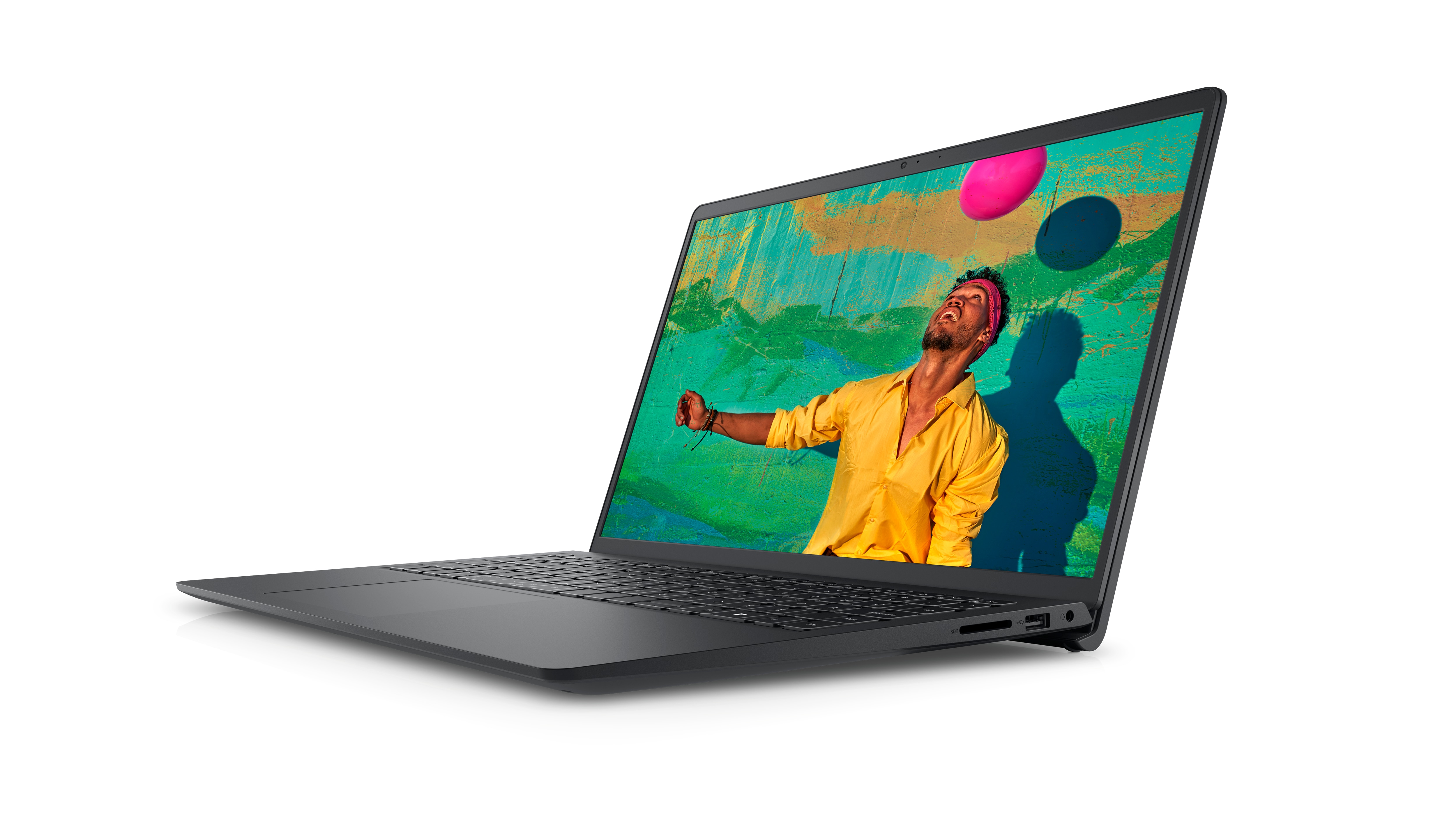 Image d’un ordinateur portable Dell Inspiron 15 3521 et d’un homme souriant, qui porte un chandail jaune et qui regarde une balle rose au-dessus de sa tête.