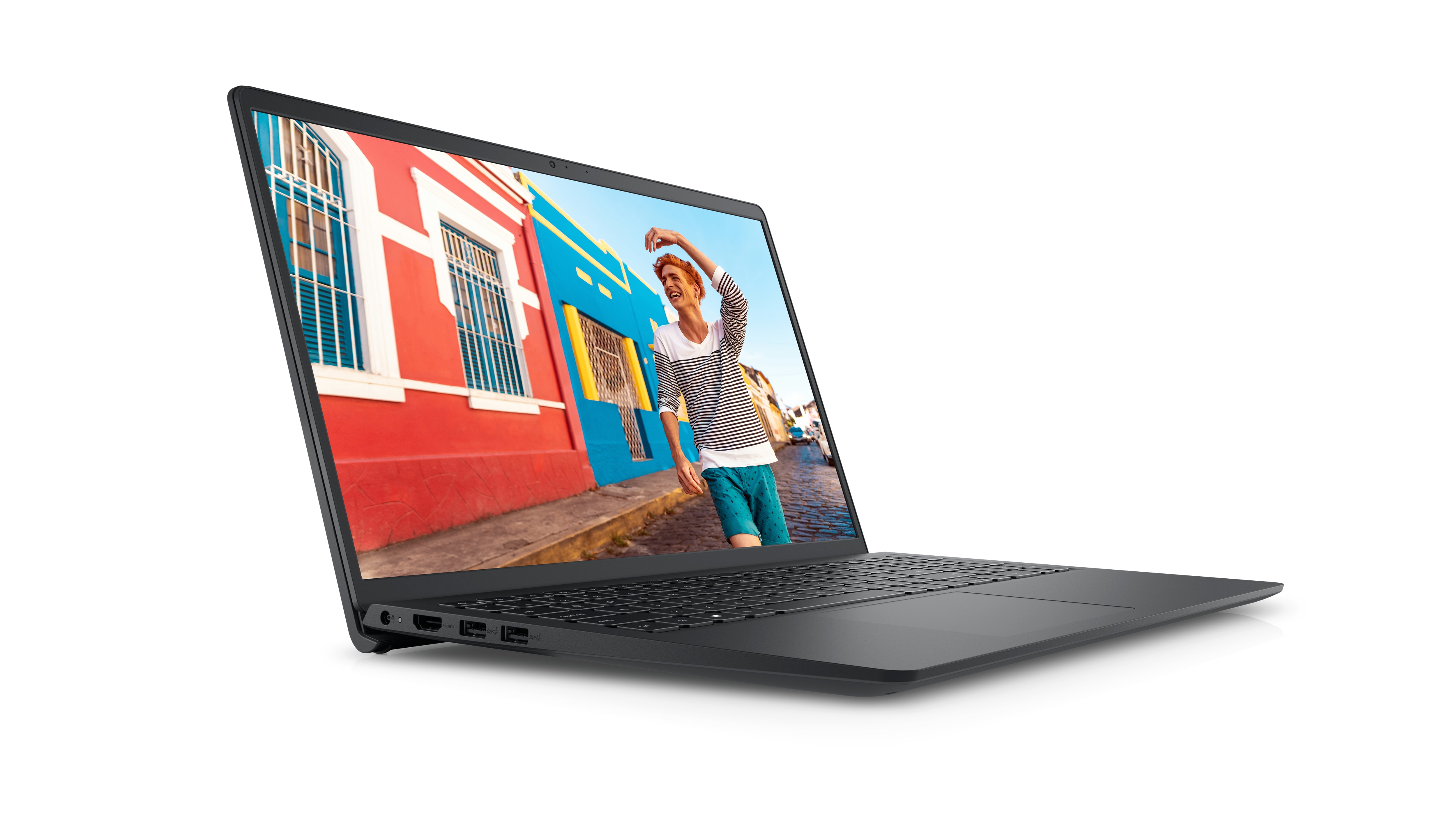Bild eines Dell Laptops vom Typ Inspiron 15 3525 mit einem lächelnden Mann in einem schwarz-weißen Hemd vor einer farbenprächtigen Landschaft.