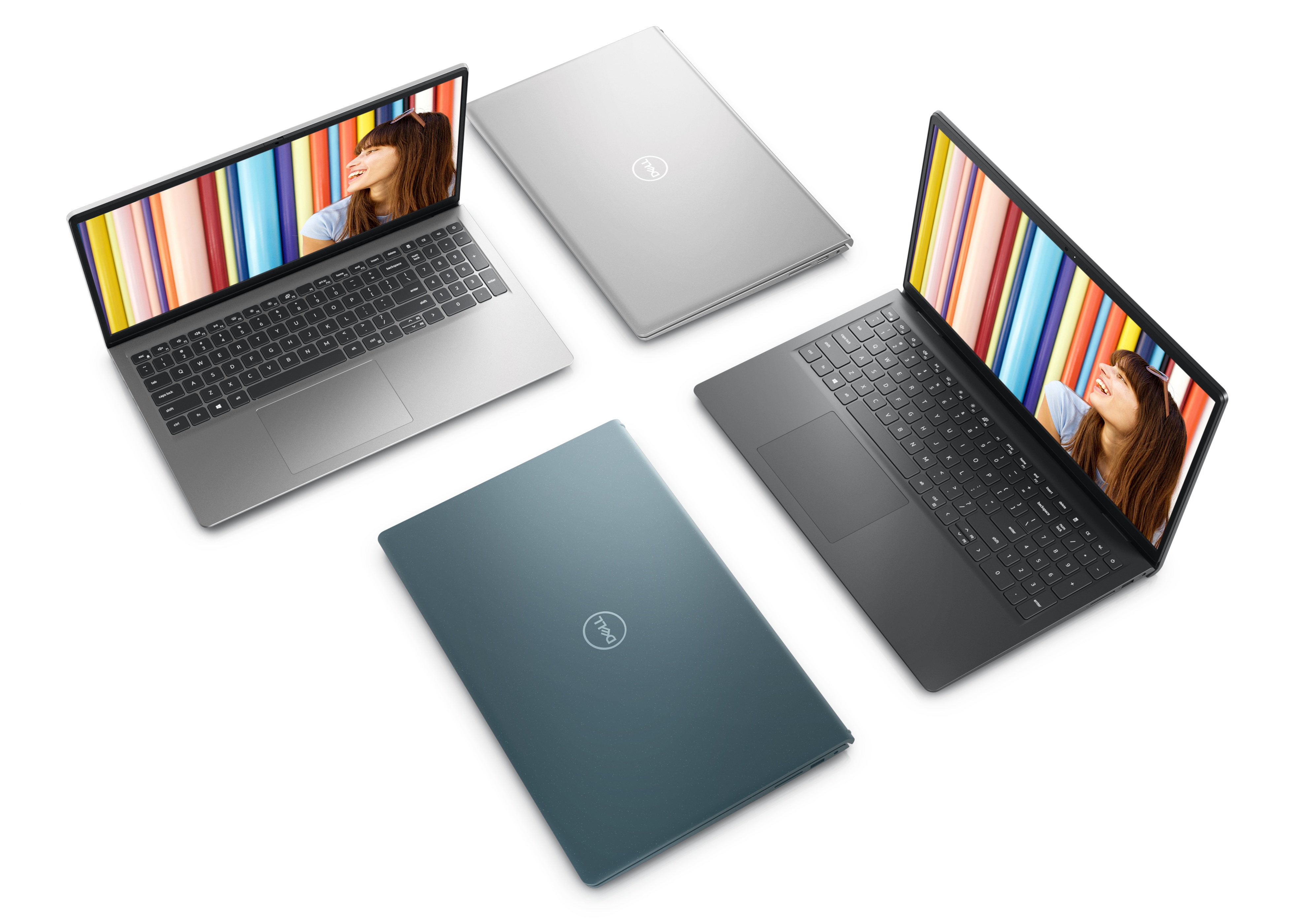 Picture of four Dell Inspiron 15 3525 Laptops placed side by side, two opened and two closed. 