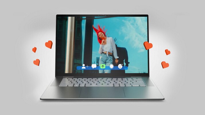 Picture of an Inspiron 16 7620 2-in-1 with a redhead woman and red hearts floating off the screen.