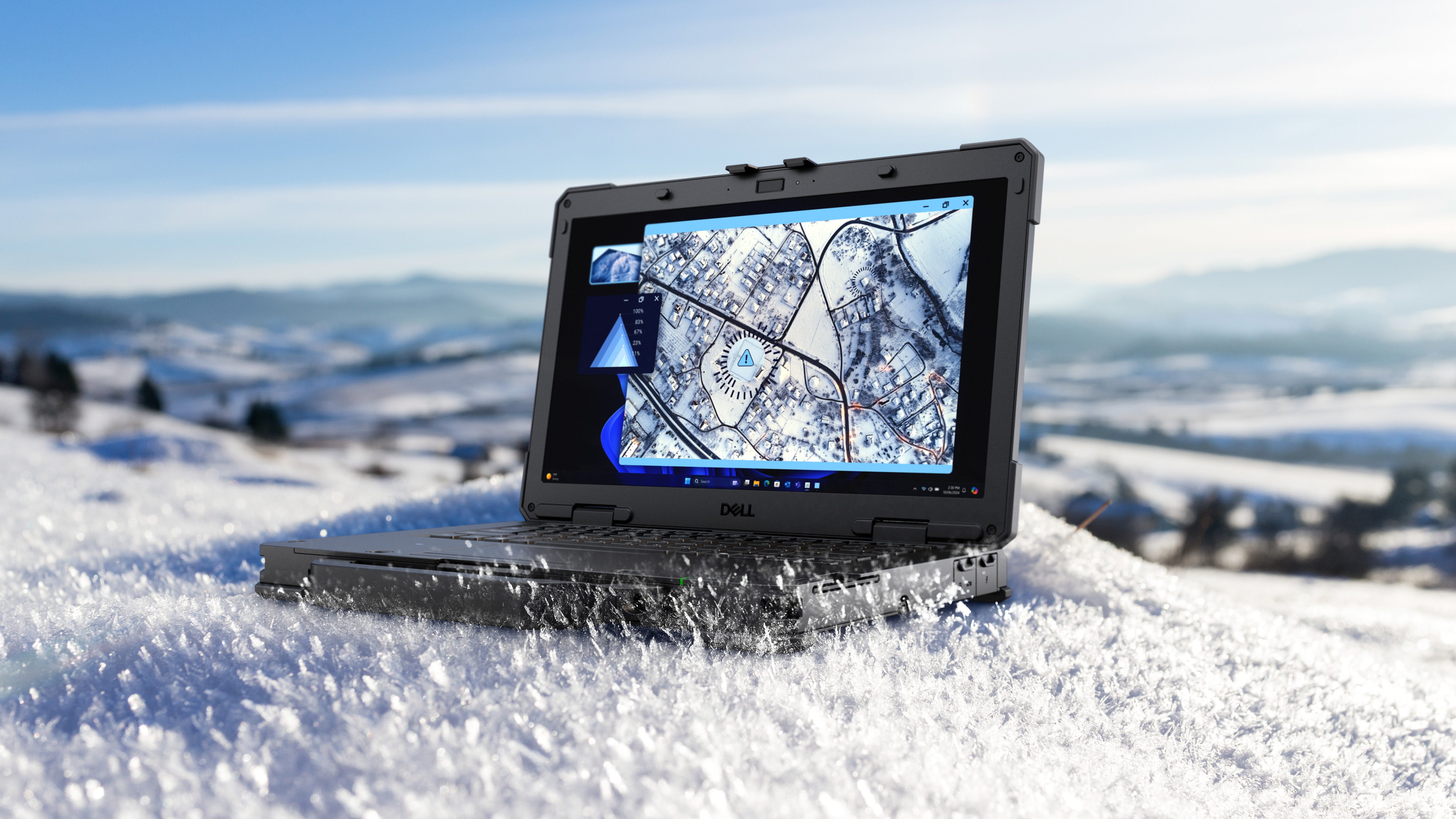 Rugged sitting on excavated rock with small pieces hitting the screen