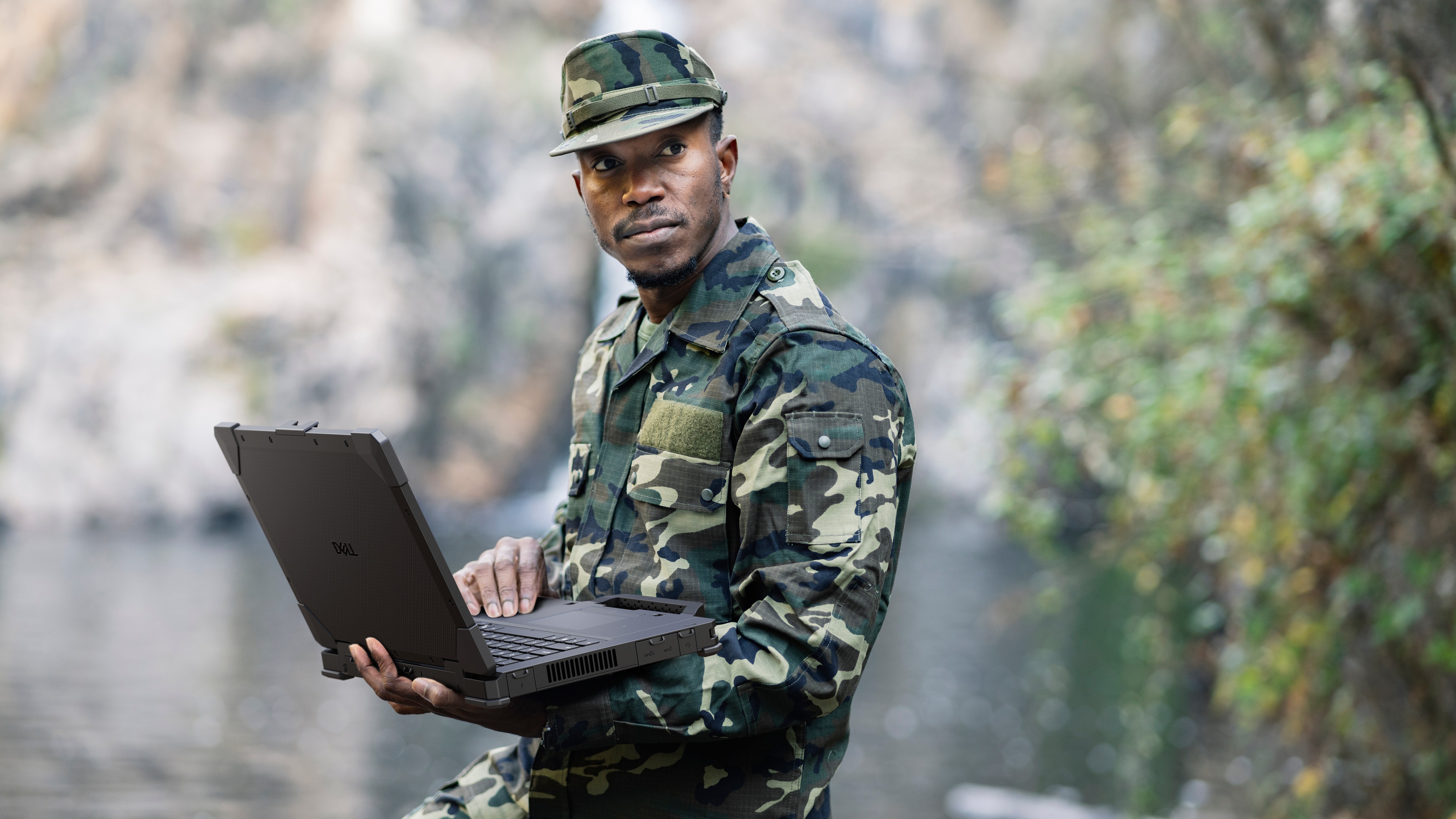 Military personnel working on a Rugged in the forest