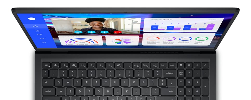 Imagem de um Dell Vostro 15 3525 visto de cima com parte do teclado aparecendo e a foto de uma mulher sorridente na tela.