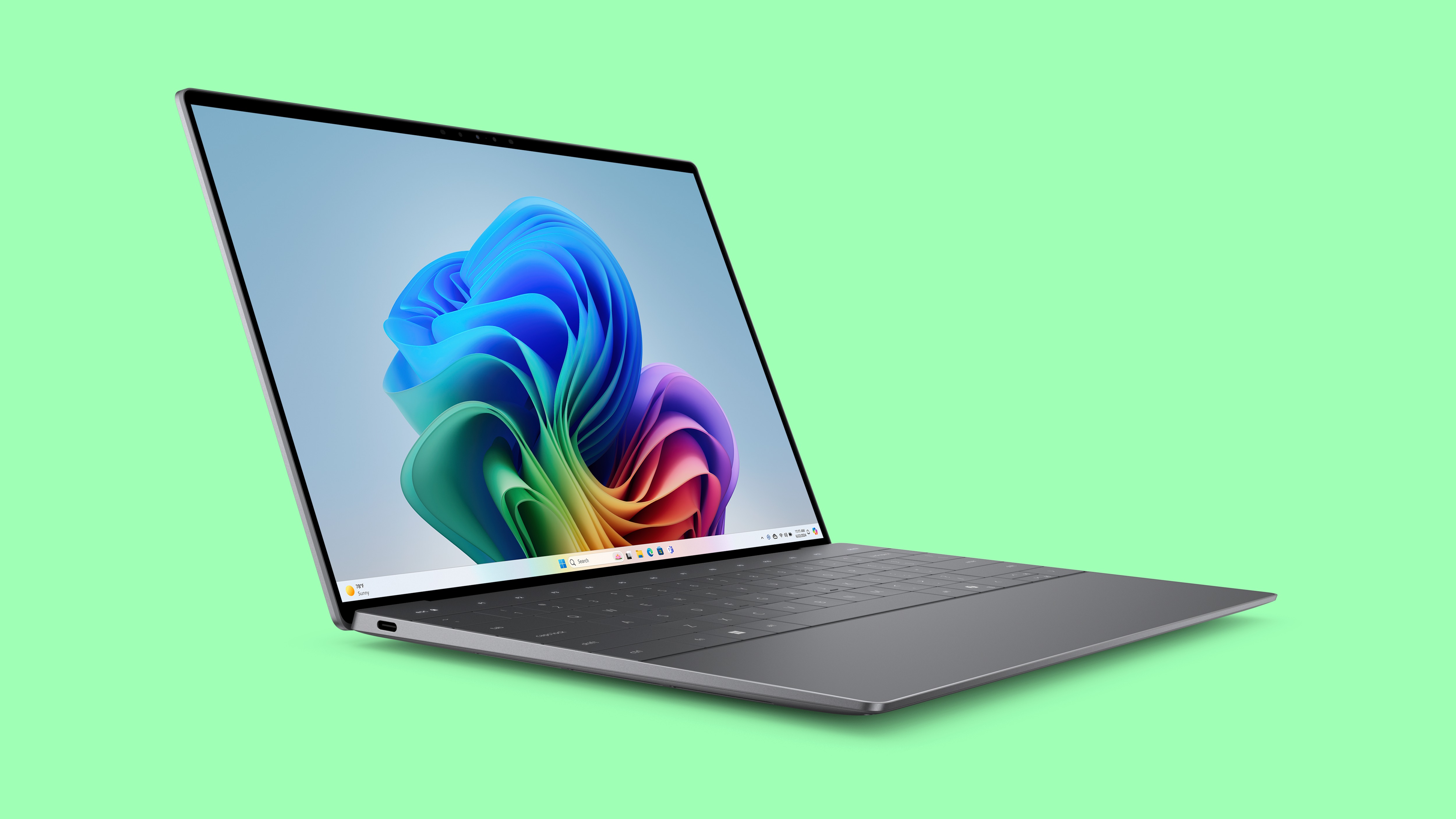 Person working on XPS 13 laptop, Windows 11 user interface displayed.