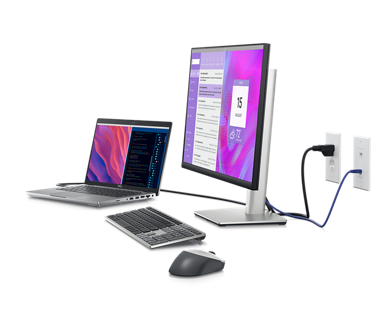 Изображение монитора Dell P2423DE, подключенного к ноутбуку Dell, клавиатуре и мыши.