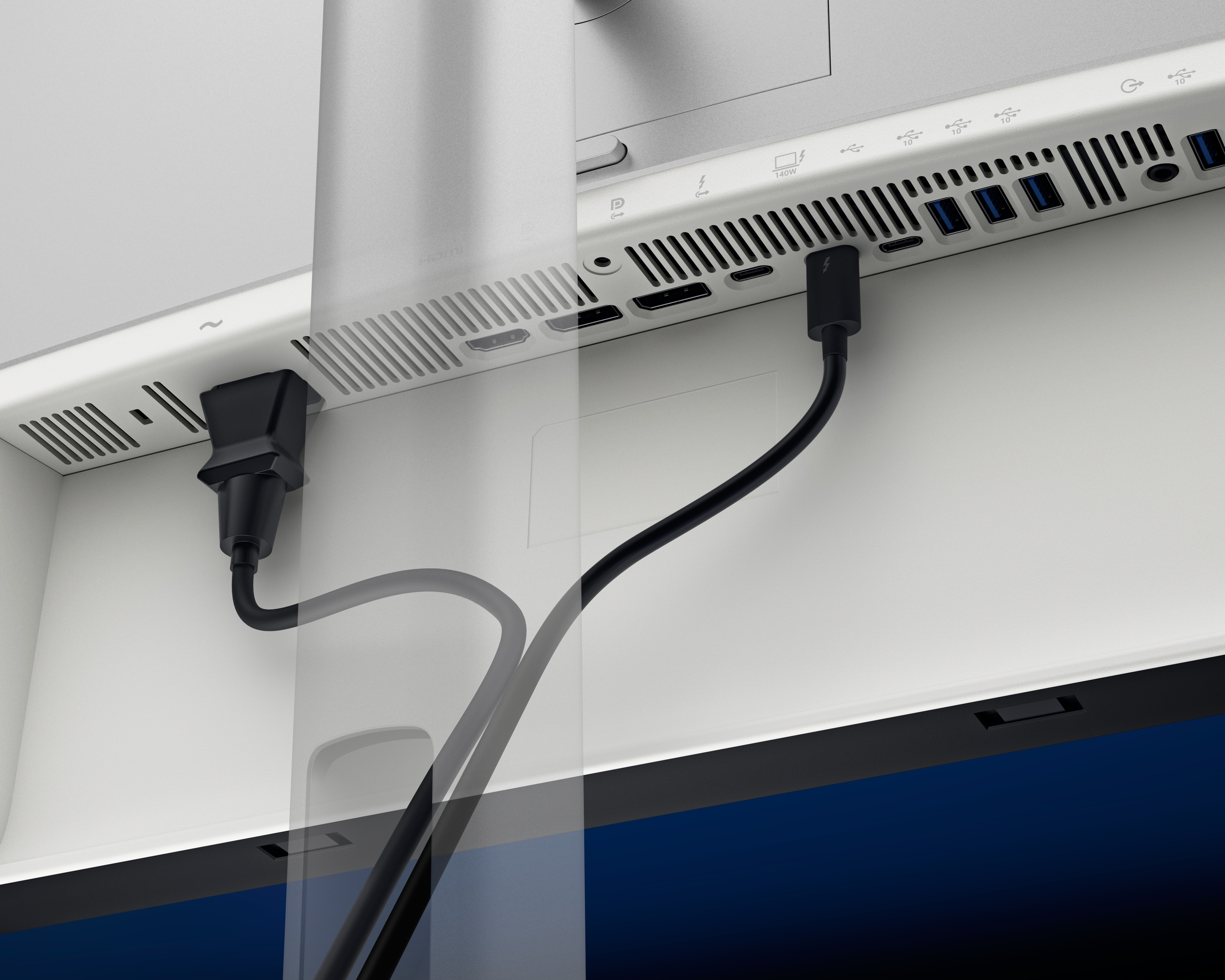插入 Thunderbolt™ 4 纜線的 UltraSharp 32 4K Thunderbolt Hub 顯示器背面連接埠。