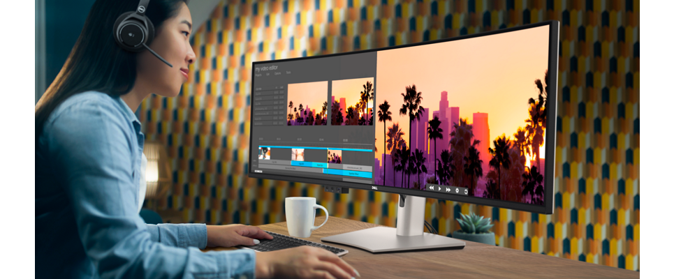 Video editor working on Dell Ultrasharp 49" Curved Monitor