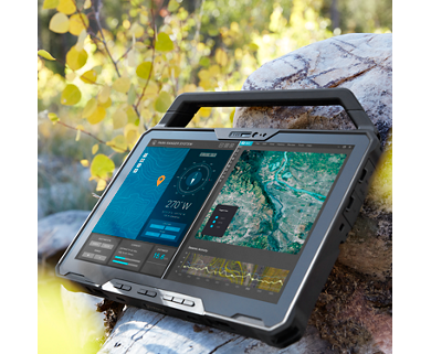 Dell Latitude 12 7230 tablet leaning against a rock outdoors